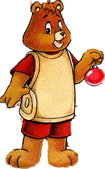 Teddy holds up a Christmas ornament